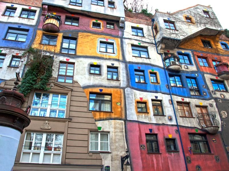 colorful exterior of the hundertwasser house apartment complex