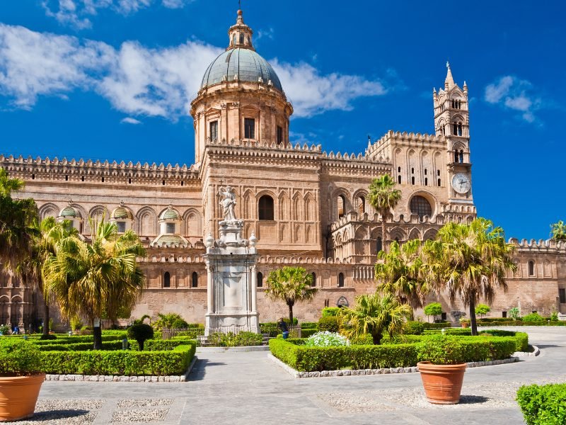 palermo cathedral on a sunny day with gardens