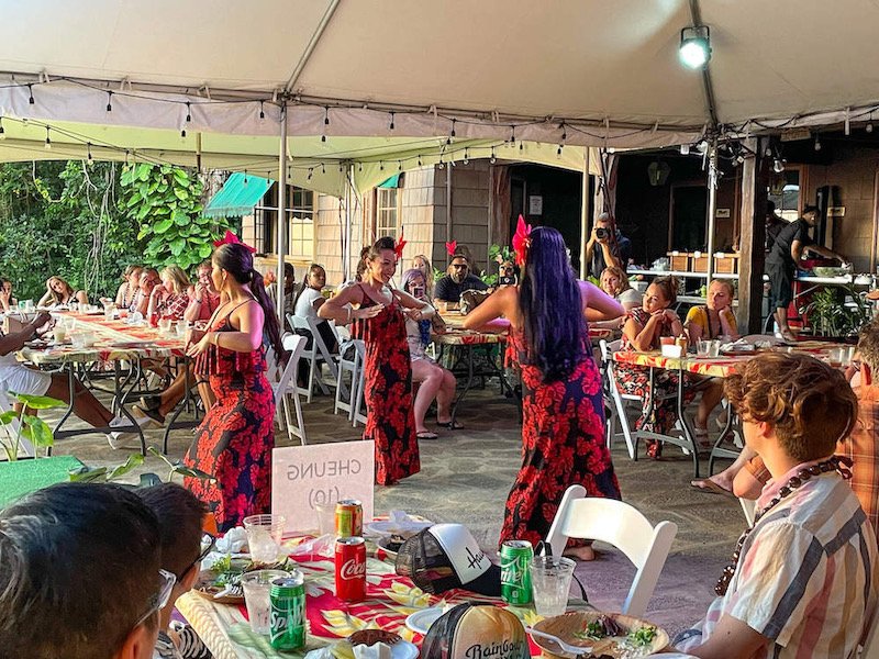 dancers performing hawaiian dance at a luau on oahu