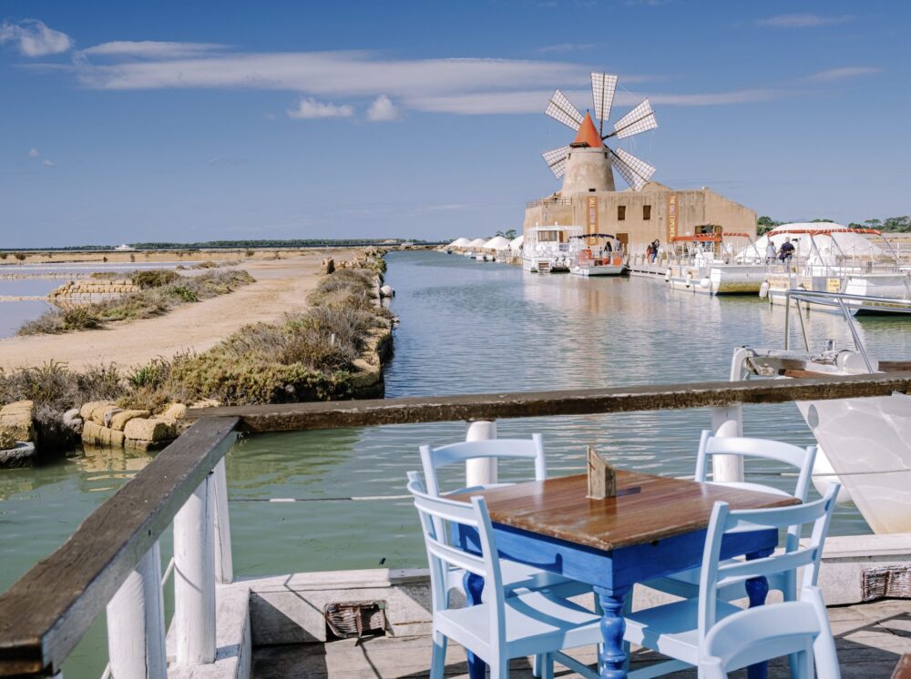 windmill and salt pans in the west of sicily