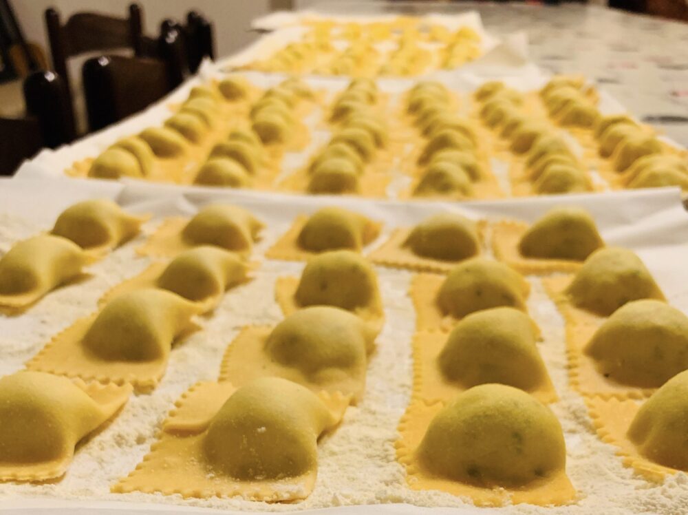 handmade stuffed ravioli on a table in rome while taking a cooking class in rome in winter