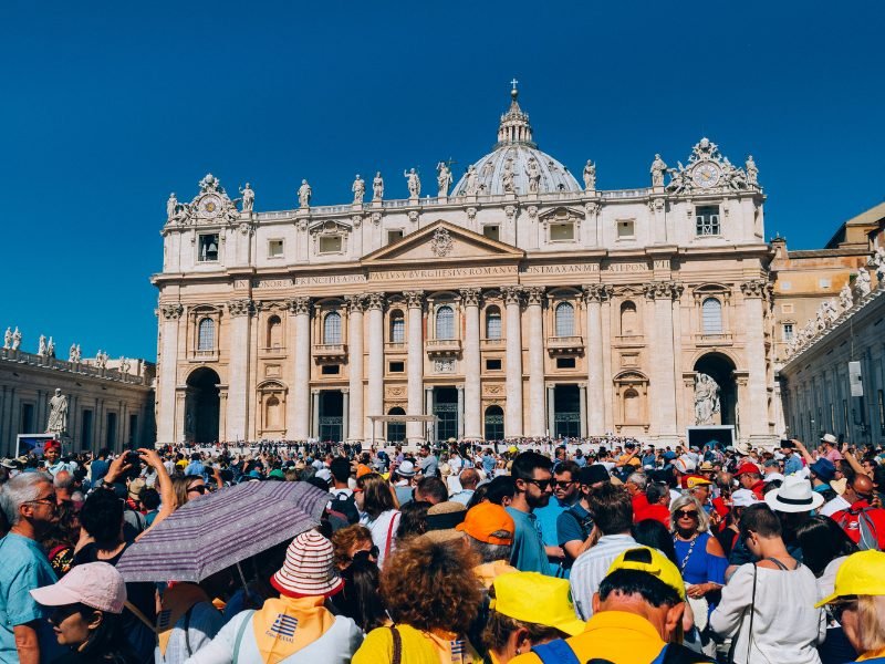 large crowd gathered outside the vatican in italy