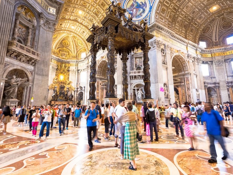 people in st peters basilica in the vatican