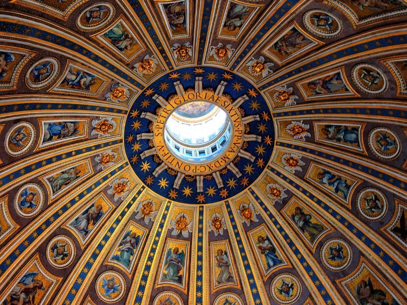 a beautiful skylight cupola decorated to the nines in the vatican