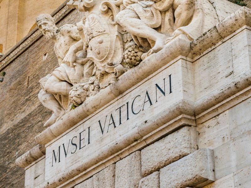 The Vatican Museums sign  for entry into this famous historical building