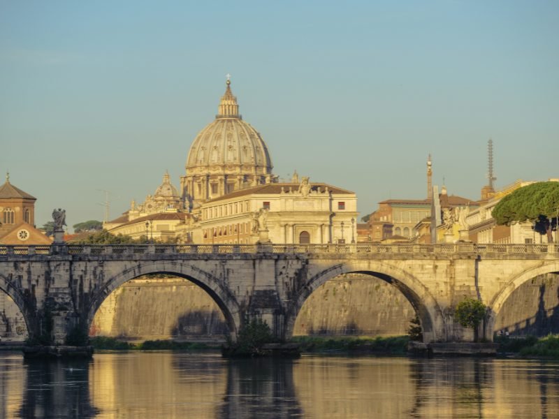 view of the vatican as seen from a bridge