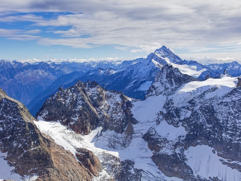 peaks covered in snow at mt titlis in switzerland, one of the best day trips you can take from zurich or lucerne