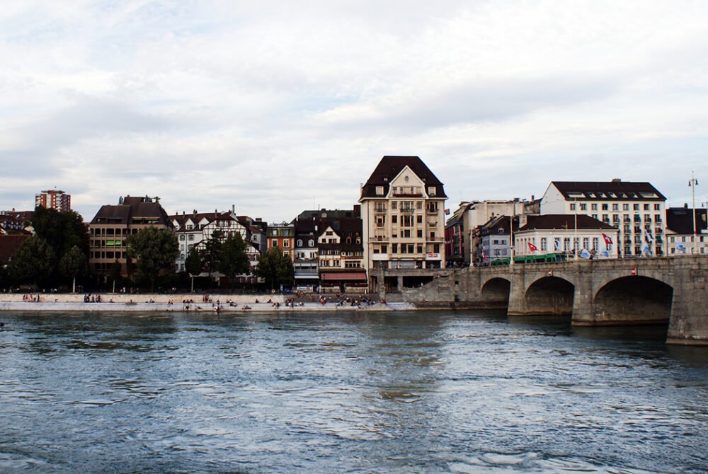 the scenic old town of basel on the water with a bridge