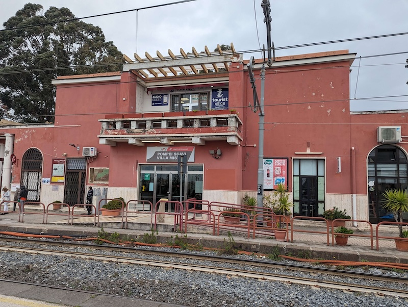 The red colored train station at Pompei Scavi on the Circumvesuviana line
