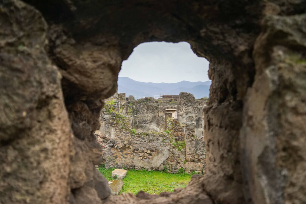 View of Pompeii and mountains and beautiful surrounding area of the ancient city's ruins