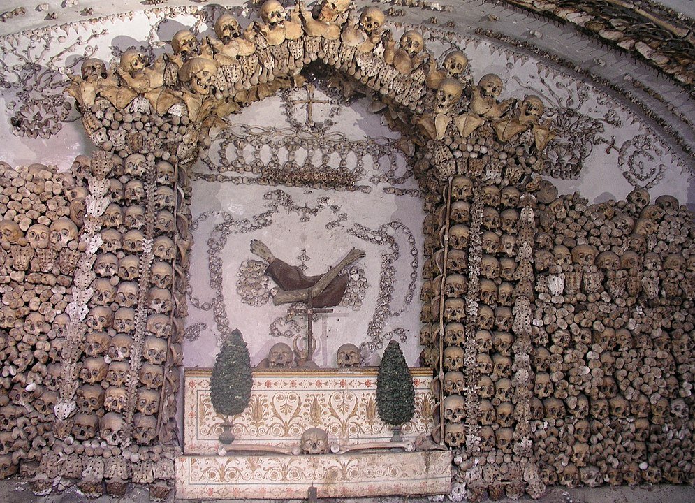 lots of skull sand other bones that form an altarpiece looking structure in the capuchin crypt