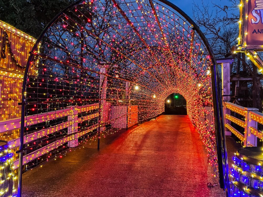 Tunnel of colorful red yellow and orange lights in Branson Missouri a fun place to get away in December