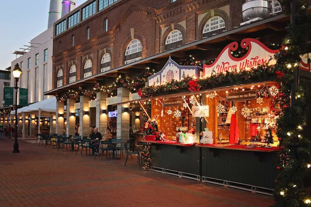 Lit up Christmas market stalls on the Savannah waterfront area, all festive for the holiday season