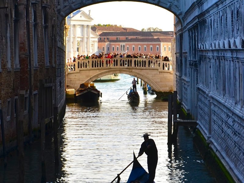 People on boats in Venice in winter