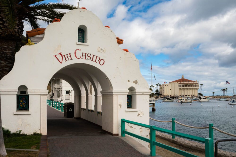 A pathway leading to the famous Casino in Avalon (a round building on a pier) on the water in Catalina Island in California