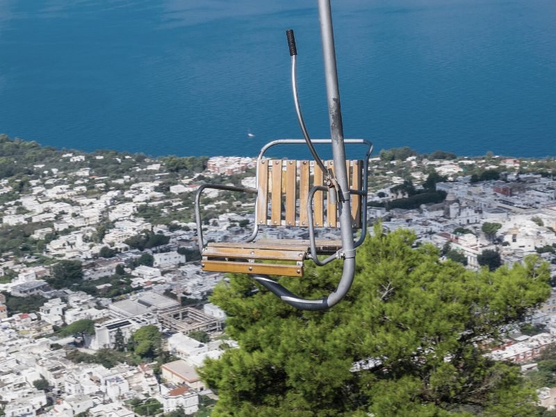 The scenic chairlift that brings you to the highest point of Capri with views of Anacapri and the waters off the coast of Capri below it.