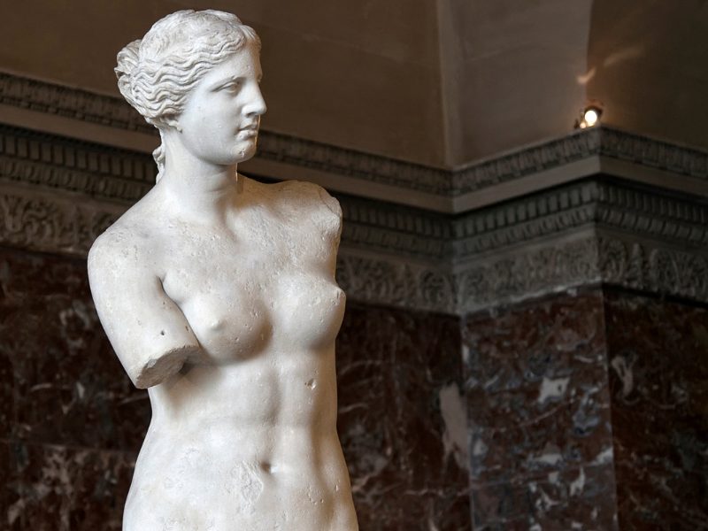 The famous armless Venus de Milo statue is one of the most visited pieces of art in the Louvre