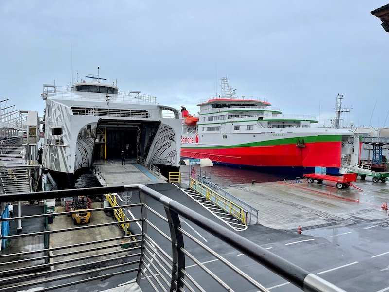 Ferries in the ferry port in Tahiti on the way to Moorea on a rainy day