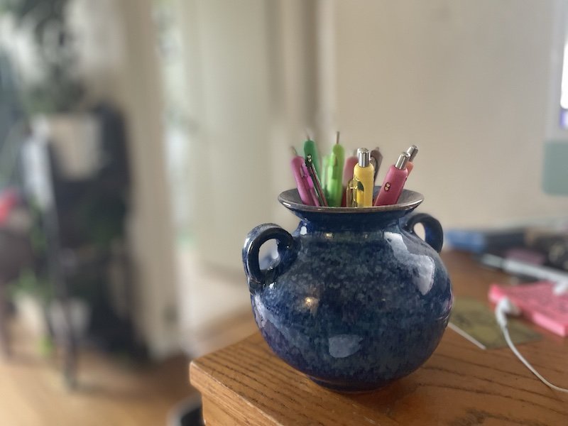 Vase full of colorful pens