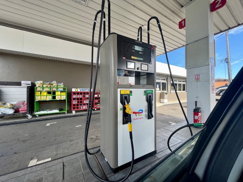 Filling up on gas in Tahiti at a gas station