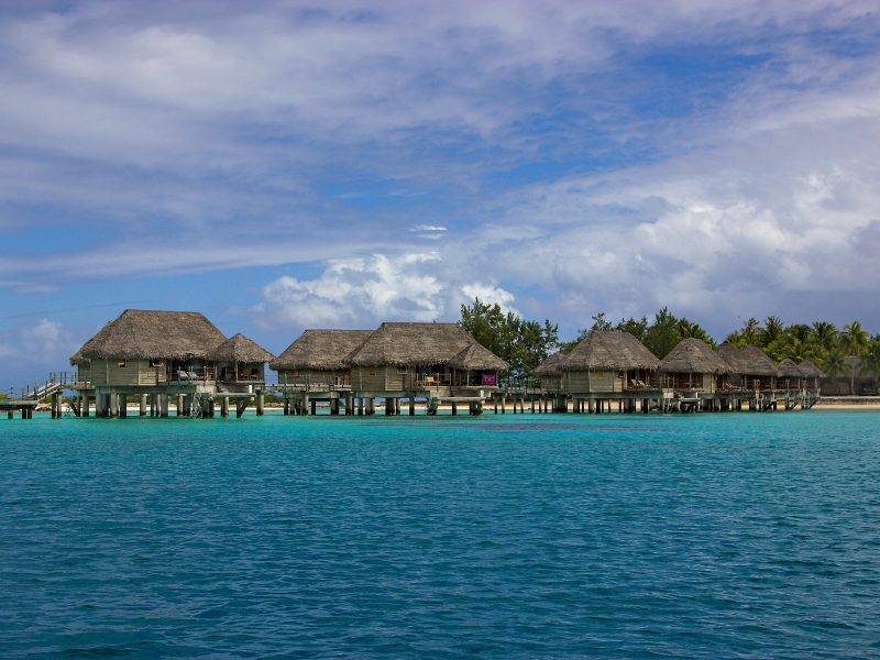 Overwater bungalows on the island of Tikehau in the outer islands of Tahiti