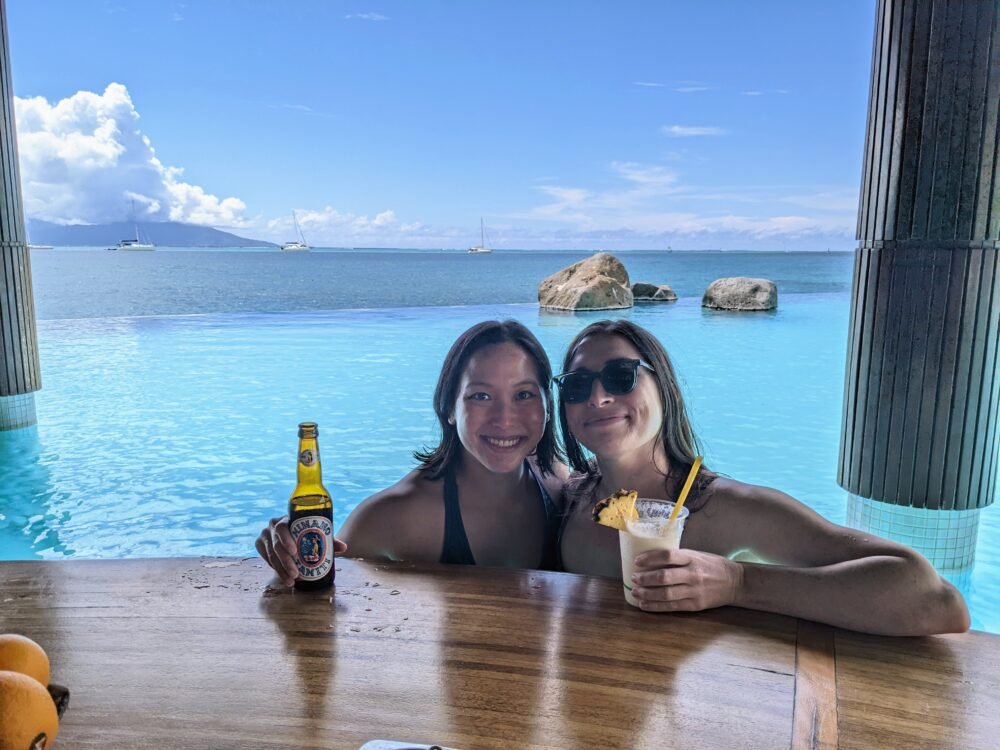 Allison and her partner having a drink at the swim up bar at the Intercontinental in Tahiti