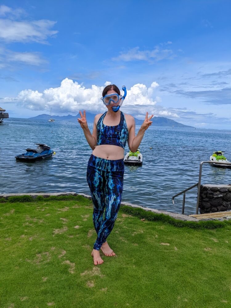 Allison wearing her favorite water-friendly, reef-friendly swim leggings and her trusty snorkel and mask set!