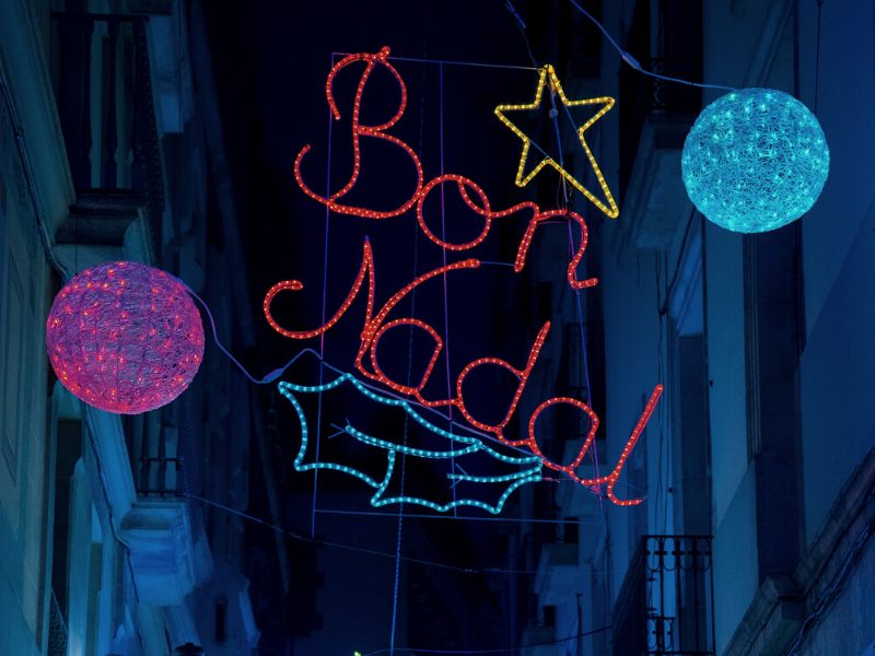 colorful neon lights that read 'bon nadal' which is catalan for merry christmas