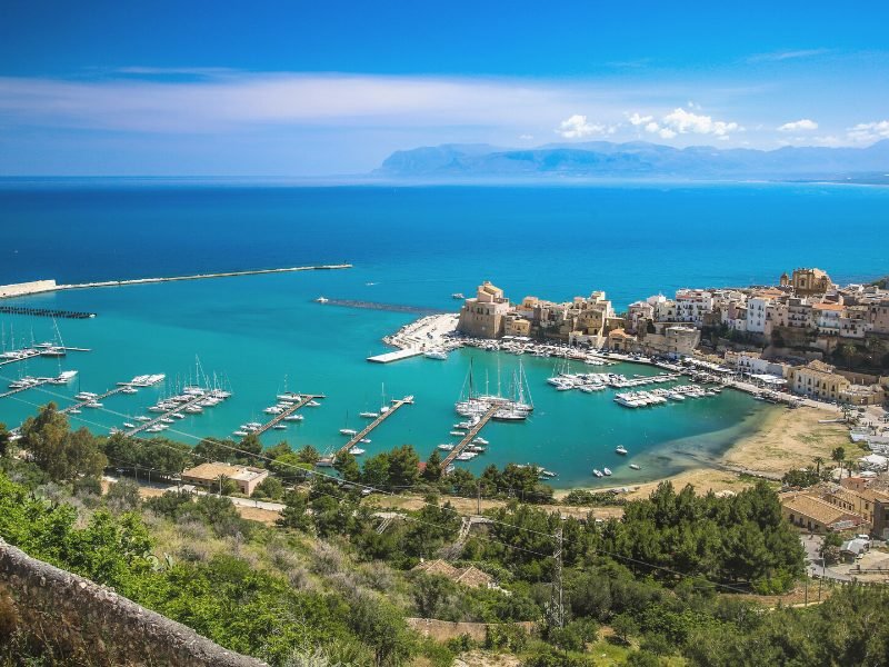 The view of  Castellammare del Golfo  as seen from above, looking at the Arab Norman castle and the marina and boats in the harbor