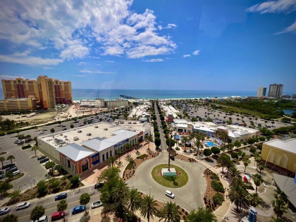 View over a traffic circle with views of the beach and pier in Panama City Beach, a popular February in USA destination