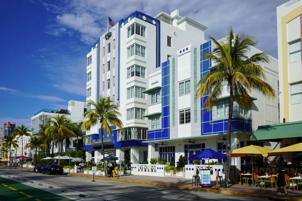 Architectural detailing of Miami with palm trees and distinctive Miami style architecture on a clear day