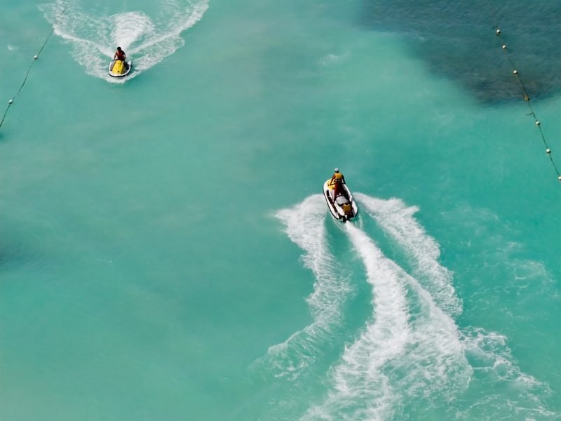 aerial view of people on jet skis