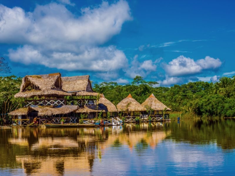 Floating structure with boats on the Amazon River in the Iquitos area of the Peruvian amazon rainforest