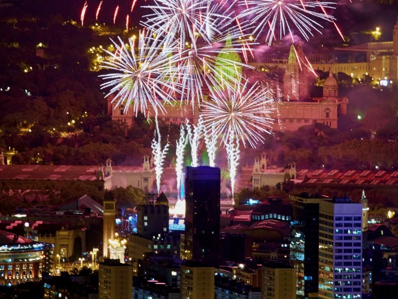 Fireworks erupting over Barcelona skyline for New Years Eve