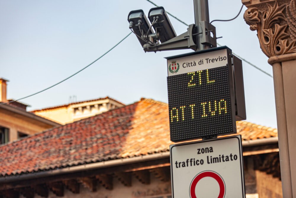 Restricted traffic zone road sign in Italy for the historic center of Treviso, sign reads "ZTL attiva" "zona traffico limitato"