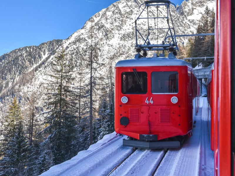 red train in Chamonix in winter