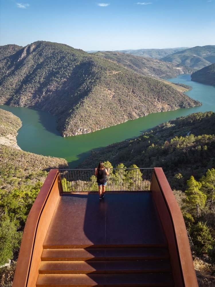The Ujo observation deck which juts out over the Douro Valley landscape with a sweeping view of the river, hills, and vineyards