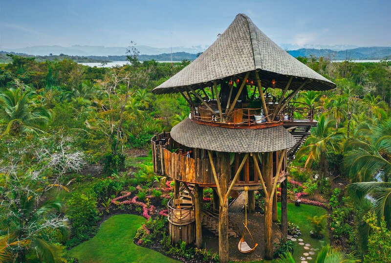 indonesian wooden house style of a joglo in bocas del toro at a resort called nayara with overwater bungalows