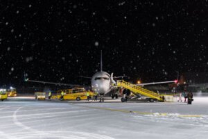 kiruna airport with snow and dark sky