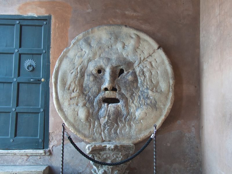 famous mouth of truth sculpture with a hole where its mouth is, a famous rome landmark