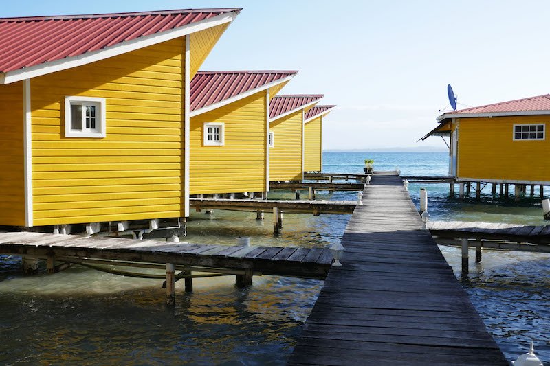 Yellow bungalows and a boardwalk