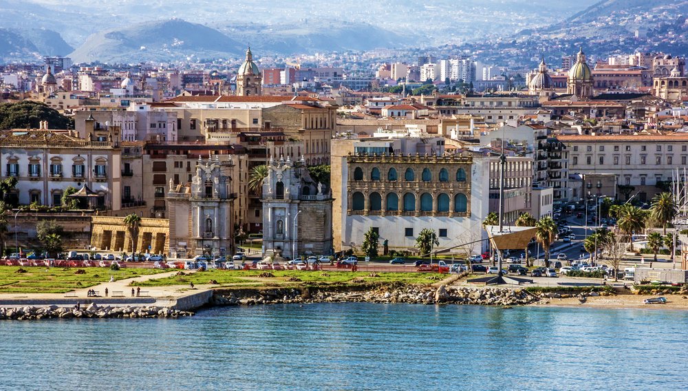 The coastline of Palermo with the city at the edge of the sea, detail of the city center and its many ornate architectural sights, part of this Palermo itinerary.