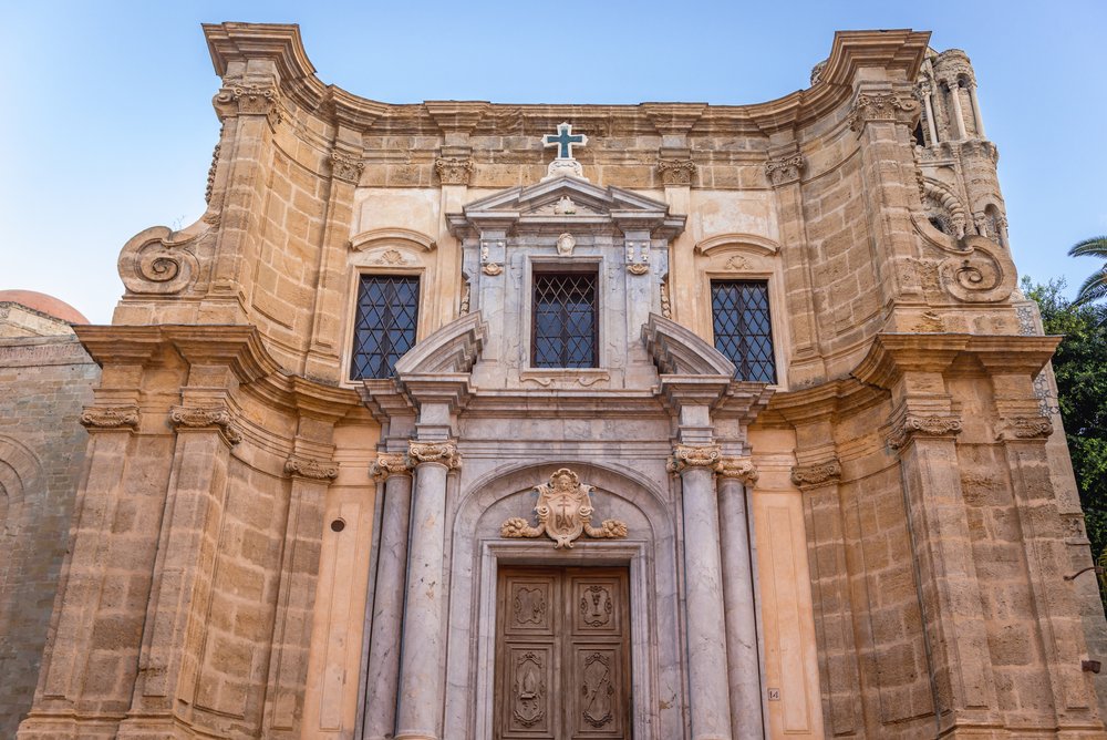 Frontage of Martorana Church in Palermo, Sicily Island in Italy, with crest, cross, marble pillars, and other architectural details