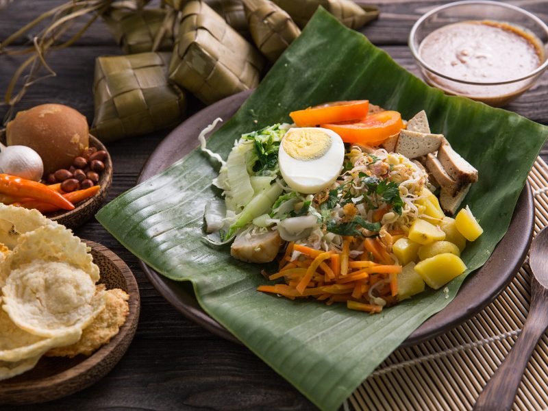 Traditional Indonesian gado gado, made of a mix of vegetables, tofu, egg, and served with a peanut sauce
