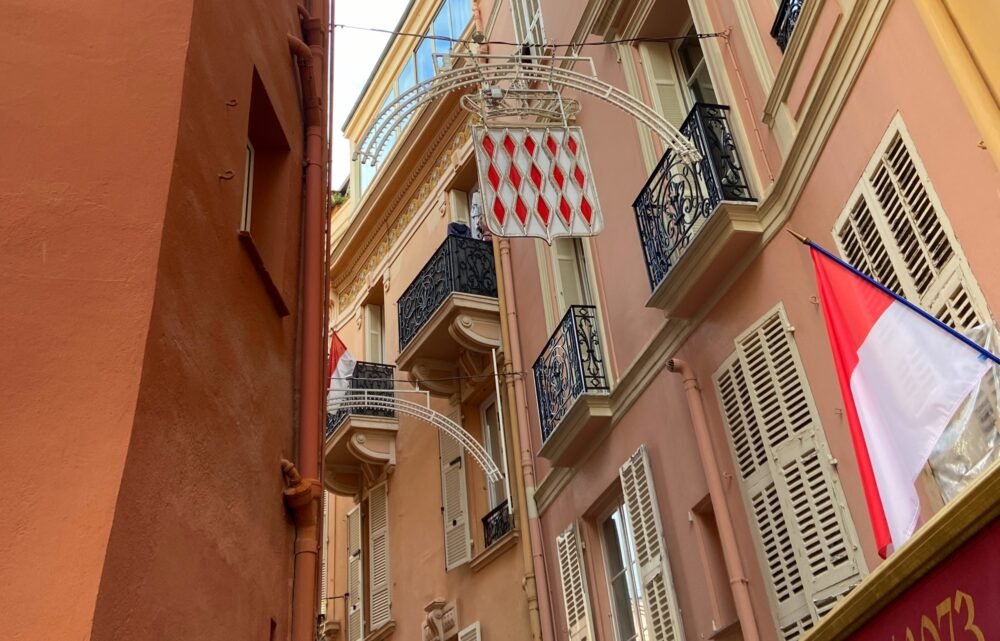 street details of monaco with the red and white flag and emblematic design of monaco