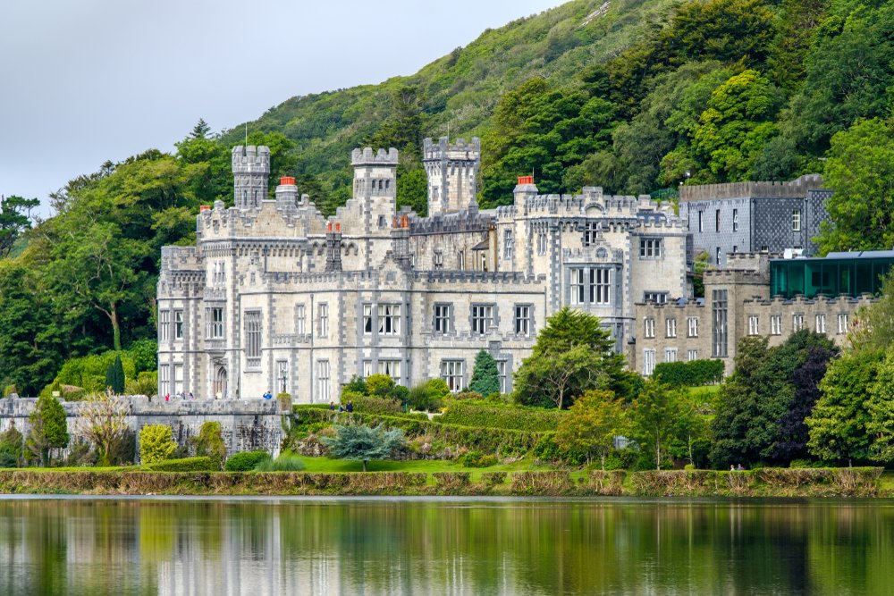 The abbey of Kylemore on the river, looking like a castle