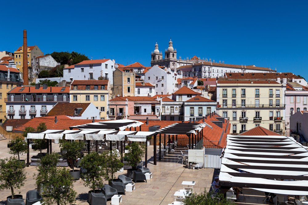 Beautiful view of Lisbon, Portugal, view on monastery/cathedral and Alfama old historical district from the Portas do Sol viewpoint