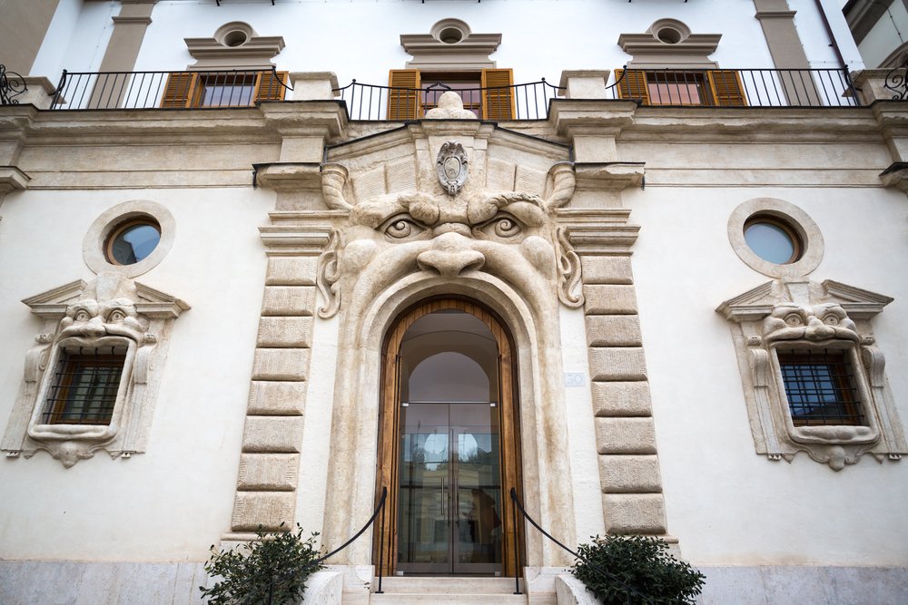 Exterior of Palazzo Zuccari, with a door framing that makes it look like the door is a monster's mouth