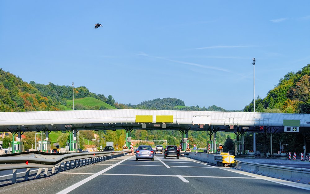 Lanes on the motorway with yellow lanes demarcated for the Telepass users