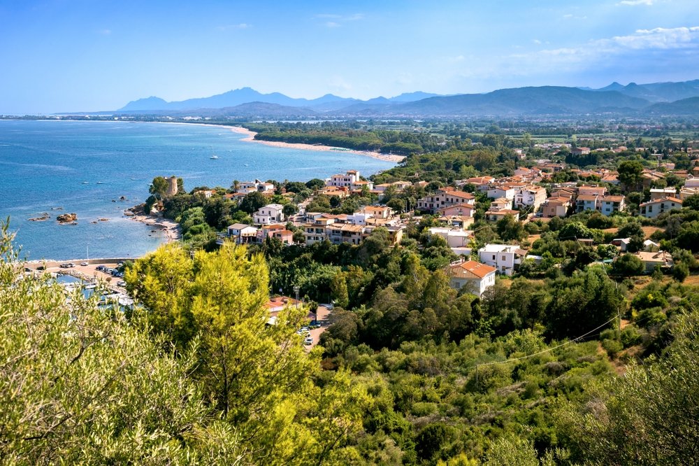 Aerial landscape of Santa Maria Navarrese, on Sardinia, with a view of the charming Sardinian coastal town from above while hiking